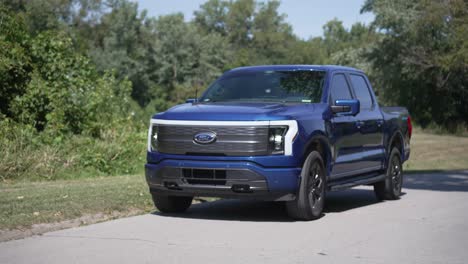 Ford-F150-lightning-truck-driving-down-the-road