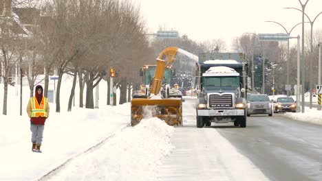 Truck-And-Tractor-Snow-Blower-On-The-Road-Snow-Clearing-After-Snowstorm-In-Montreal,-Canada