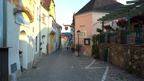 People-Walking-in-Durnstein---a-small-town-on-the-Danube-river-in-the-Krems-Land-district,-in-the-Austrian-state-of-Lower-Austria