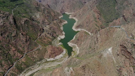 aerial-view-in-orbit-over-the-Parralillo-dam-and-where-the-mill-viewpoint-can-be-seen