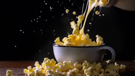 Popcorn-and-fresh-butter-in-bowl-food-background