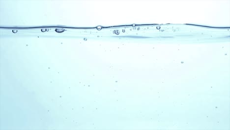 Ice-cubes-falling-under-water-in-slow-motion