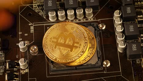 Monedas-De-Oro-Bit-Coin-Monedas-Btc-En-La-Placa-Base.-Bitcoin-Es-Una-Criptomoneda-Mundial-Y-Un-Sistema-De-Pago-Digital-Llamado-La-Primera-Moneda-Digital-Descentralizada.