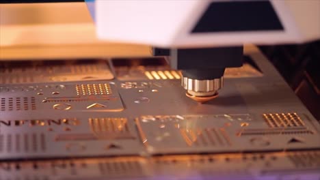 CNC-Laser-cutting-of-metal-in-slow-motion,-modern-industrial-technology.