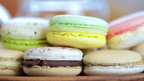 Close-up-of-colorful-macaron-(macaroon)-on-the-table-with-hot-tea