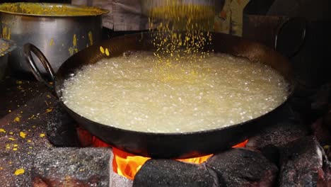 Indian-street-food.-Boondi-or-Bundiya-is-an-Indian-dessert-made-from-sweetened,-fried-chickpea-flour.-Being-very-sweet,-it-can-only-be-stored-for-a-week-or-so.-Rajasthan-state-in-western-India.