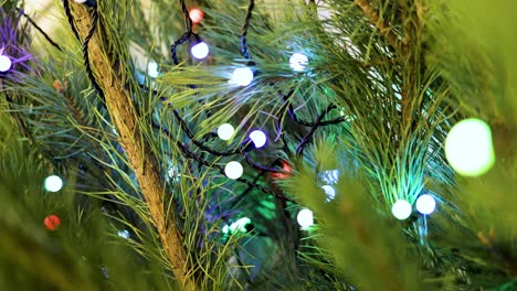 Christmas-tree-garland-decoration-of-the-Christmas-tree-closeup