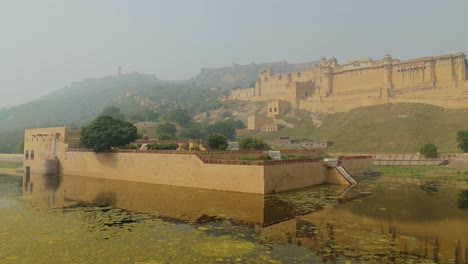 Amer-Fort-is-a-fort-located-in-Amer,-Rajasthan,-India.-Located-high-on-a-hill,-it-is-the-principal-tourist-attraction-in-Jaipur.