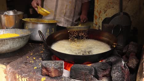 Indian-street-food.-Boondi-or-Bundiya-is-an-Indian-dessert-made-from-sweetened,-fried-chickpea-flour.-Being-very-sweet,-it-can-only-be-stored-for-a-week-or-so.-Rajasthan-state-in-western-India.