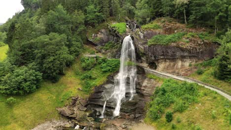 Steinsdalsfossen-is-a-waterfall-in-the-village-of-Steine-in-the-municipality-of-Kvam-in-Hordaland-county,-Norway.-The-waterfall-is-one-of-the-most-visited-tourist-sites-in-Norway.