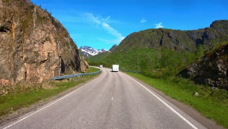 Vehicle-point-of-view-Driving-a-Car-VR-Caravan-travels-on-the-highway.-Tourism-vacation-and-traveling.-Beautiful-Nature-Norway-natural-landscape.