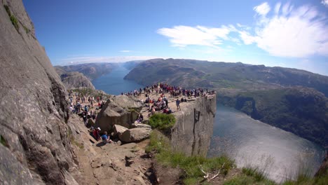 NORWAY--June-15,-2019:-Preikestolen-or-Prekestolen,-also-known-by-the-English-translations-of-Preacher's-Pulpit-or-Pulpit-Rock,-is-a-famous-tourist-attraction-in-Forsand,-Ryfylke,-Norway