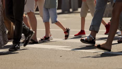 The-feet-of-people-at-the-crosswalk.