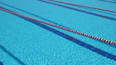 Olympic-Swimming-pool-background-on-a-bright-Sunny-day