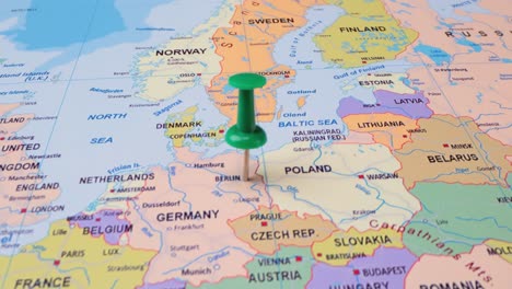 Germany---Travel-concept-with-green-pushpin-on-the-world-map.-The-location-point-on-the-map-points-to-Berlin,-the-capital-of-the-German.