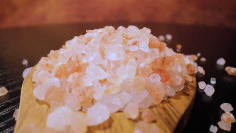 Himalayan-pink-salt-in-a-wooden-is-used-to-flavor-food.-Due-mainly-to-marketing-costs,-pink-Himalayan-salt-is-up-to-twenty-times-more-expensive-than-table-or-sea-salt.