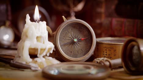 Vintage-style-travel-and-adventure.-Vintage-old-compass-and-other-vintage-items-on-the-table.