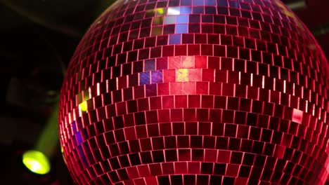 Party-Disco-ball-light-reflection-background-in-a-nightclub.