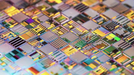 Silicon-semiconductor-wafer-close-up.-In-electronics,-a-wafer-also-called-a-slice-or-substrate-is-a-thin-slice-of-semiconductor,-a-crystalline-silicon,-used-for-the-fabrication-of-integrated-circuits