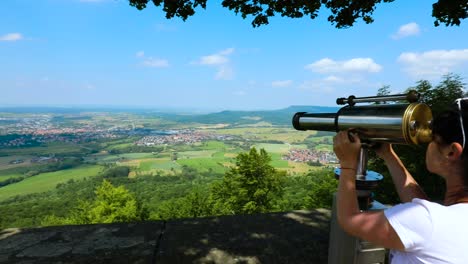 Woman-tourist-on-the-observation-deck,-viewing-platform-Hohenzollern-Castle,-Germany
