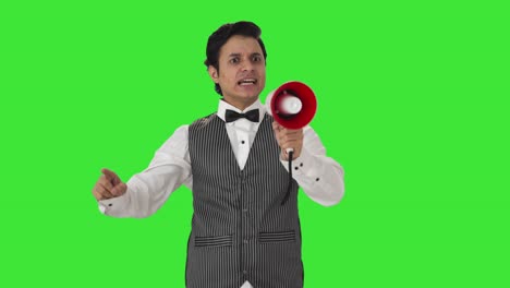 Angry-Indian-waiter-protesting-in-restaurant-Green-screen