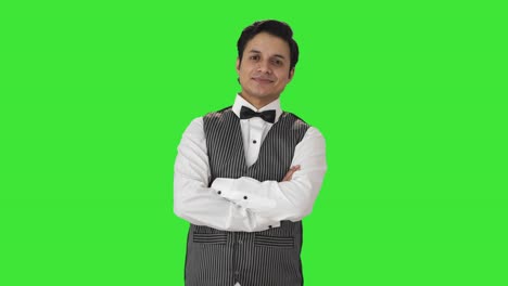 Portrait-of-Happy-Indian-waiter-Green-screen