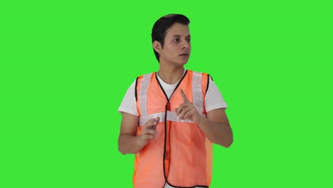 Indian-airport-ground-staff-worker-inspecting-the-field-Green-screen