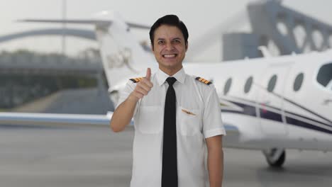Happy-Indian-pilot-doing-Thumbs-up