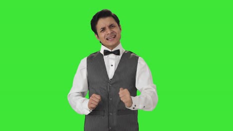 Angry-Indian-waiter-shouting-on-someone-Green-screen