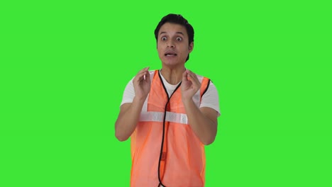 Angry-Indian-airport-ground-staff-worker-shouting-Green-screen