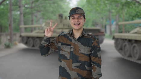 Happy-Indian-army-man-showing-victory-sign