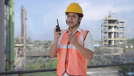 Angry-Indian-architect-shouting-on-walkie-talkie