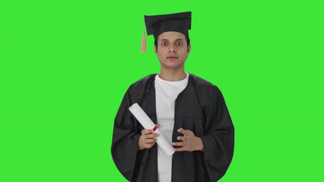 Indian-graduate-student-talking-to-the-camera-Green-screen