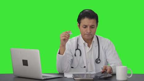 Indian-doctor-getting-shocked-after-watching-X-ray-report-Green-screen