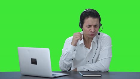 Angry-Indian-call-center-employee-shouting-on-customer-Green-screen