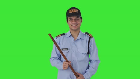 Happy-security-guard-smiling-to-the-camera-Green-screen