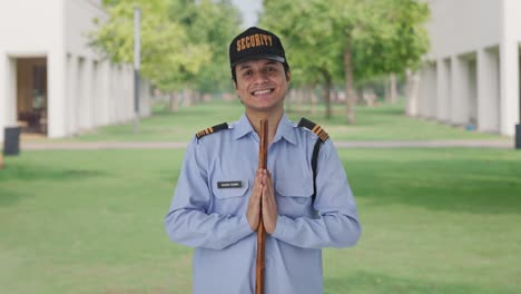 Happy-Indian-security-guard-doing-Namaste