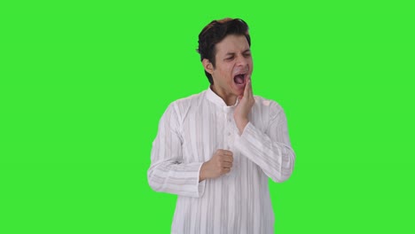 Sick-Indian-man-suffering-from-tooth-pain-Green-screen