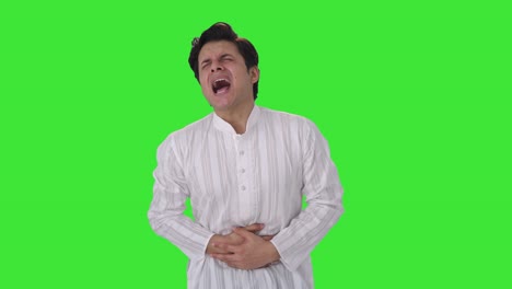 Sick-Indian-man-suffering-from-stomach-pain-Green-screen