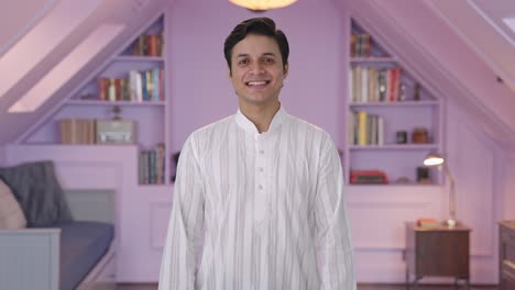 Cute-Indian-man-smiling-in-kurta-pajama