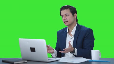 Angry-Indian-manager-shouting-on-video-call-Green-screen