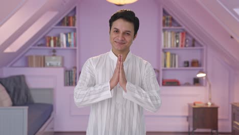 Happy-Indian-man-doing-Namaste