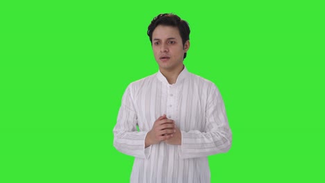 Tensed-and-stressed-Indian-man-thinking-Green-screen