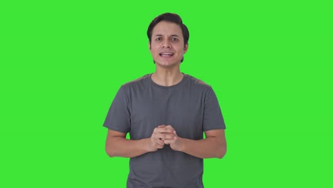 Indischer-Mann-Spricht-Glücklich-Mit-Jemandem-Auf-Grünem-Bildschirm