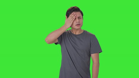 Indian-man-suffering-from-headache-Green-screen