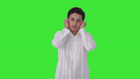 Guilty-Indian-man-apologizing-and-saying-sorry-Green-screen