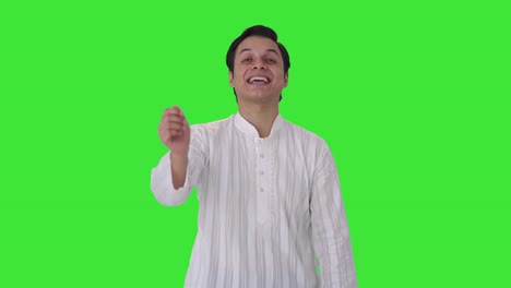 Happy-Indian-man-laughing-on-someone-Green-screen