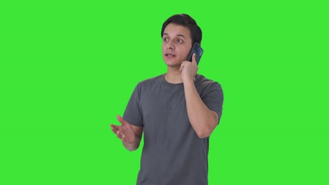 Indian-man-talking-on-call-Green-screen