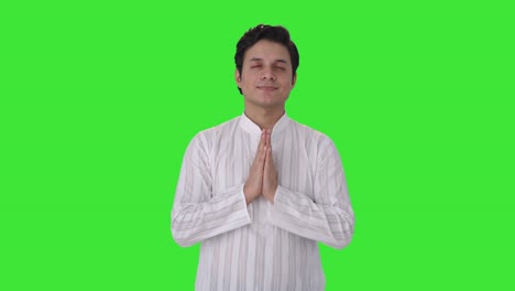 Religious-Indian-man-praying-to-God-Green-screen