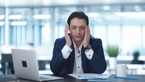 Indian-businessman-getting-stressed-at-work